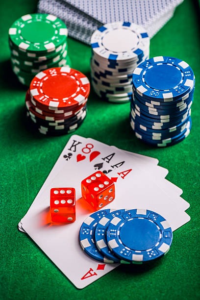 Mobile phone showing live-dealer interface with baccarat and roulette options